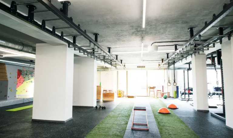 Artificial turf flooring for weight rooms 