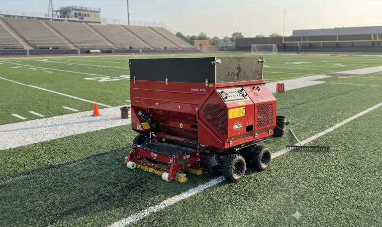 sandmatic from smg on artificial turf field