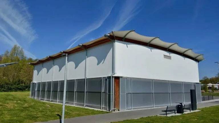 Sports canopy designed to cover a beach volleyball court