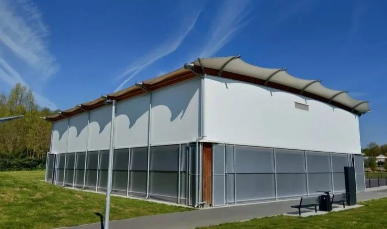 Sports canopy designed to cover a beach volleyball court
